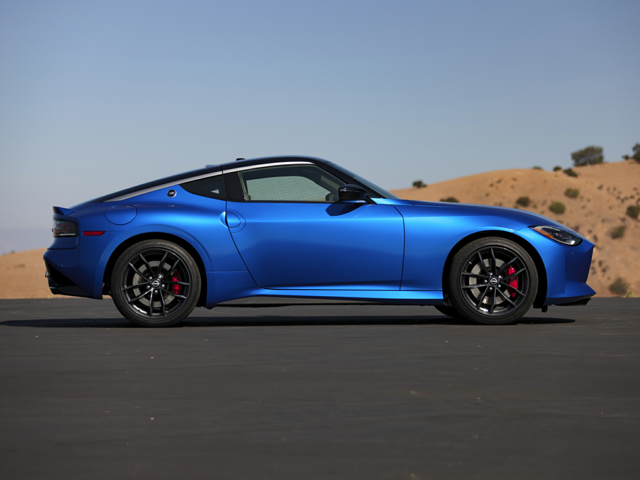 Profile view of a parked, electric blue 2024 Nissan Z. | Nissan dealer in Altoona, PA | Courtesy Nissan PA
