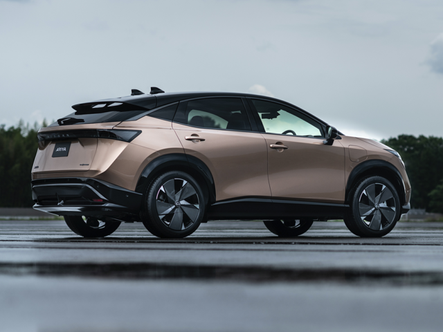 Profile view of a gold 2024 Nissan Ariya | Nissan dealer in Altoona, PA | Courtesy Nissan PA